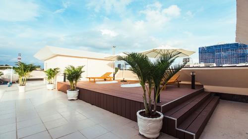 The rooftop offers a place to relax and a view of Ho Chi Minh City