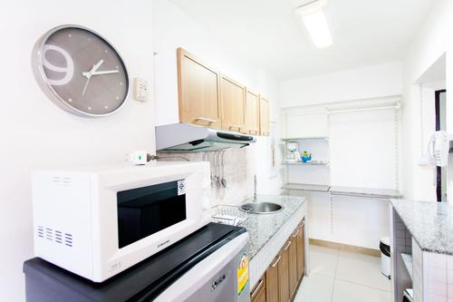Fully equipped kitchen including a microwave