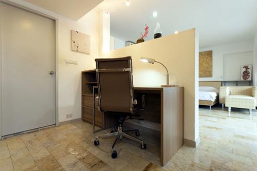 Small private office area with an office chair