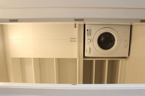 Large storage room with a washer