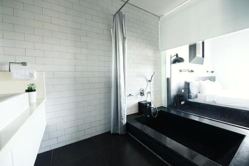Stunning modern bathroom with a hot tub